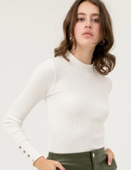 Black mock neck sweater.