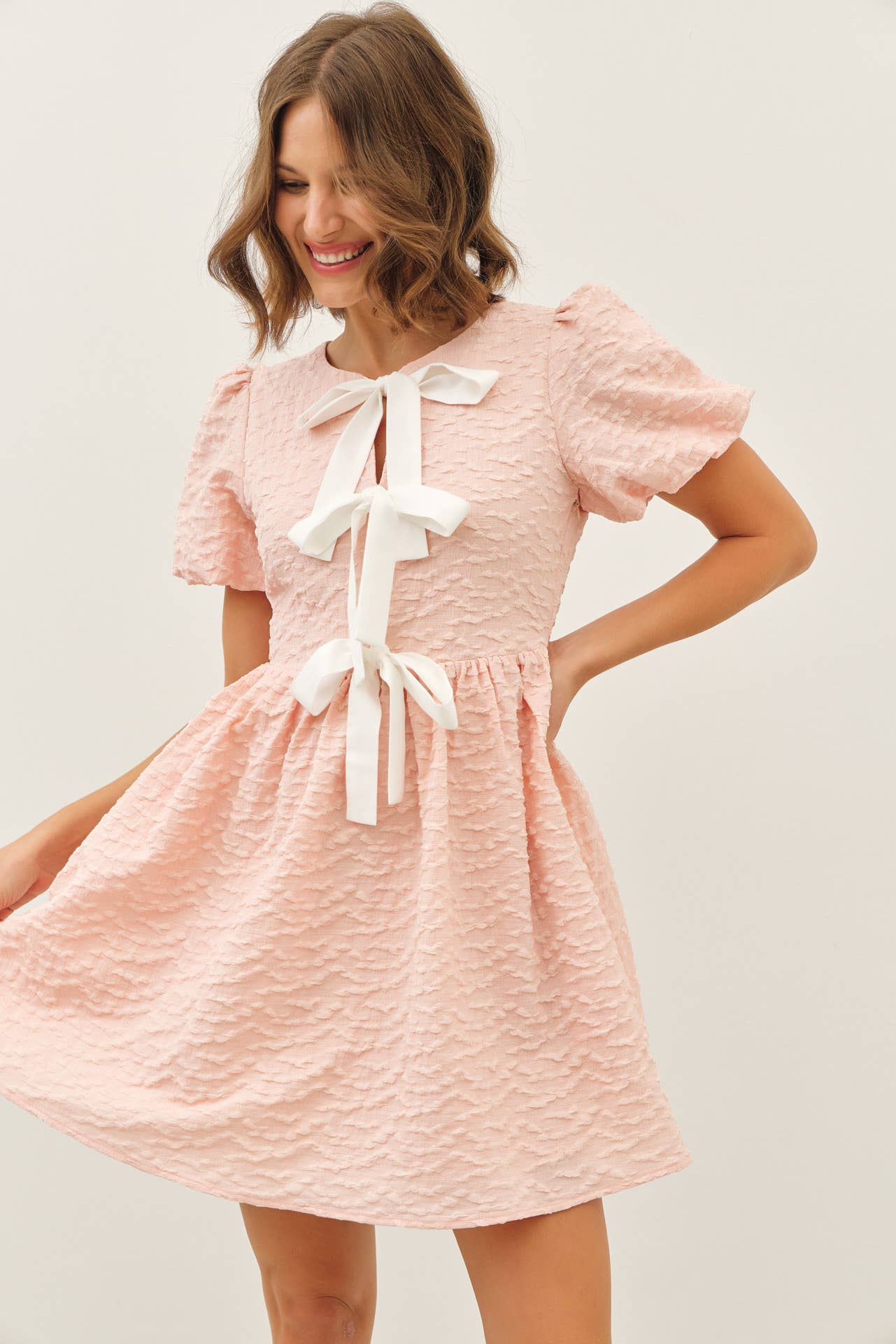 Sophie Textured Bow Dress in Apricot